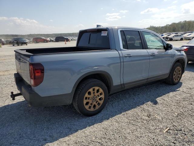Photo 3 from auction – 2023 HONDA RIDGELINE with VIN 5FPYK3F52PB065274