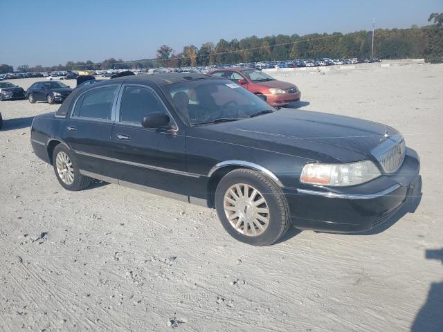 Photo 4 from auction – 2004 LINCOLN TOWN CAR E with VIN 1LNHM81W64Y688534