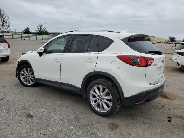 Photo 2 from auction – 2015 MAZDA CX-5 GT with VIN JM3KE2DY1F0525042