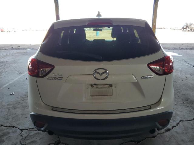 Photo 6 from auction – 2015 MAZDA CX-5 TOURI with VIN JM3KE2CYXF0505549