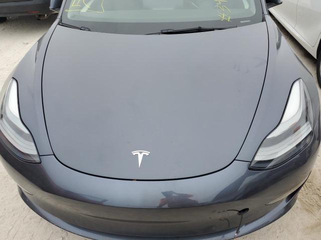 Photo 12 from auction – 2021 TESLA MODEL 3 with VIN 5YJ3E1EA6MF089232