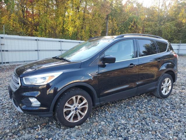 FORD ESCAPE SE 2018 with VIN 1FMCU9GD3JUA32123 - Photo from auction
