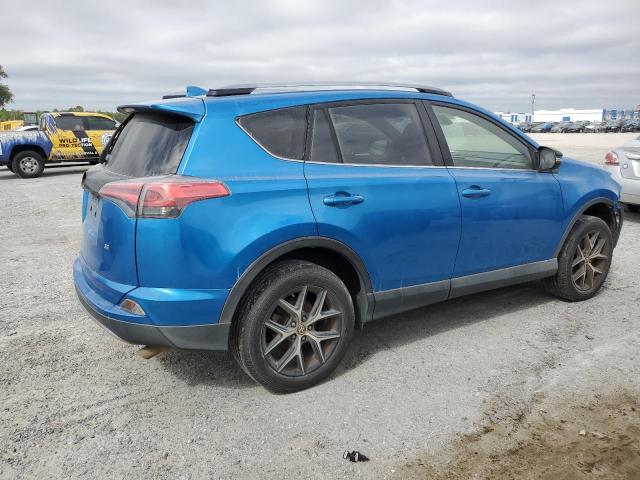 Photo 3 from auction – 2017 TOYOTA RAV4 SE with VIN JTMNFREV0HJ716528
