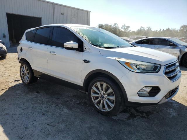 Photo 4 from auction – 2017 FORD ESCAPE TIT with VIN 1FMCU0J95HUA09582
