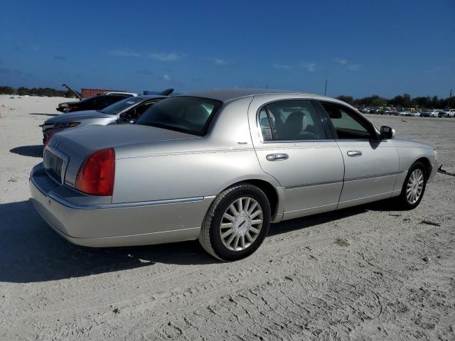 Photo 3 from auction – 2004 LINCOLN TOWN CAR U with VIN 1LNHM83W64Y660553
