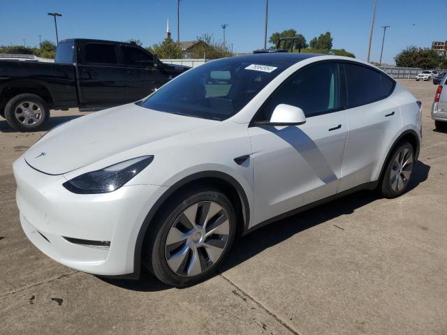 TESLA MODEL Y 2023 with VIN 7SAYGDEE5PF669888 - Photo from auction