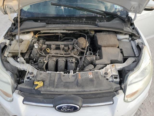Photo 11 from auction – 2014 FORD FOCUS SE with VIN 1FADP3F24EL455713