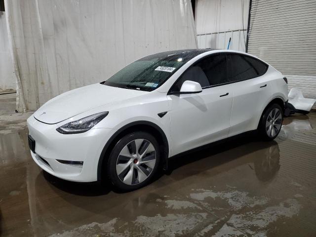 TESLA MODEL Y 2023 with VIN 7SAYGDEE0PF615382 - Photo from auction
