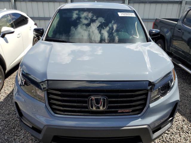 Photo 5 from auction – 2023 HONDA RIDGELINE with VIN 5FPYK3F11PB038600