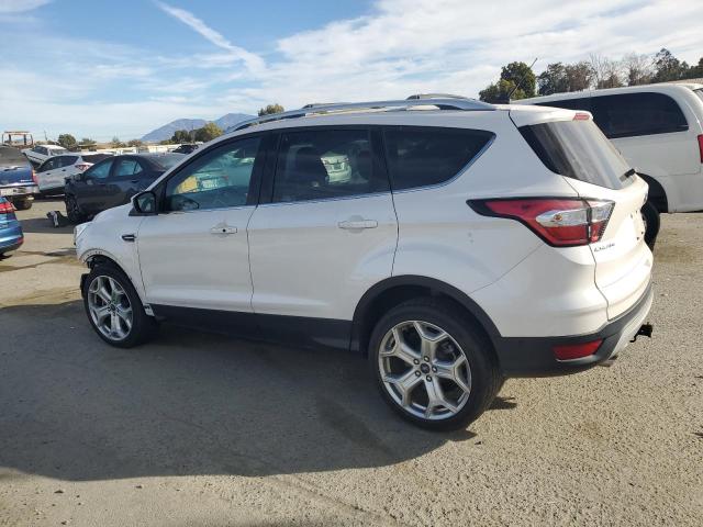 Photo 2 from auction – 2018 FORD ESCAPE TIT with VIN 1FMCU9J92JUC19583