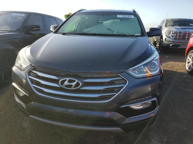 Photo 5 from auction – 2017 HYUNDAI SANTA FE S with VIN 5NMZU3LB5HH030391
