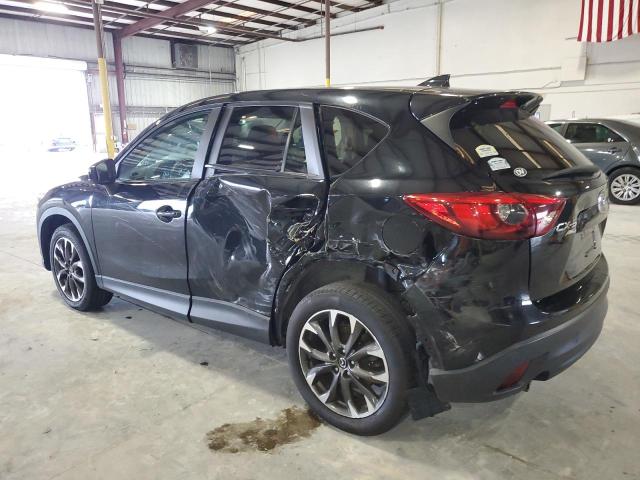 Photo 2 from auction – 2016 MAZDA CX-5 GT with VIN JM3KE4DY7G0697931