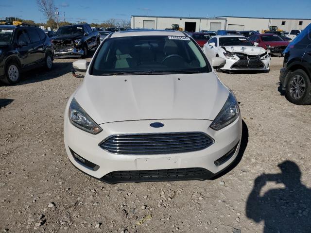Photo 5 from auction – 2017 FORD FOCUS TITA with VIN 1FADP3J28HL288316