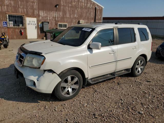 HONDA PILOT TOUR 2013 with VIN 5FNYF4H93DB052922 - Photo from auction