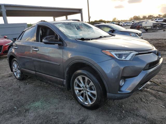 Photo 4 from auction – 2018 TOYOTA RAV4 LIMIT with VIN JTMYFREV1JD116540