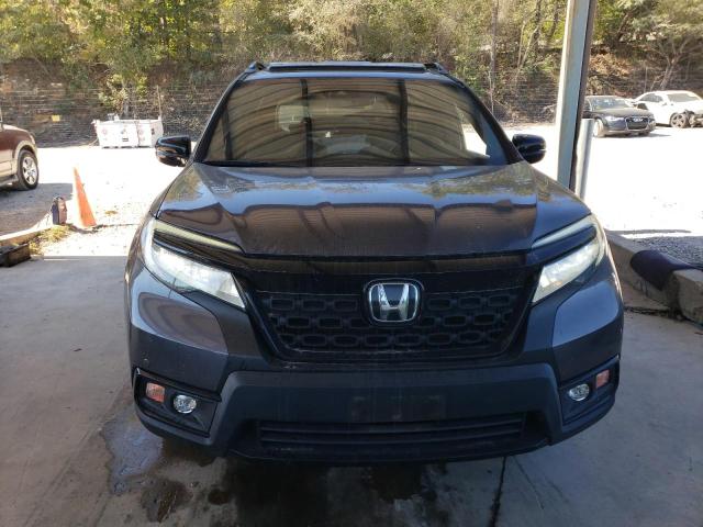 Photo 5 from auction – 2021 HONDA PASSPORT E with VIN 5FNYF8H04MB033322