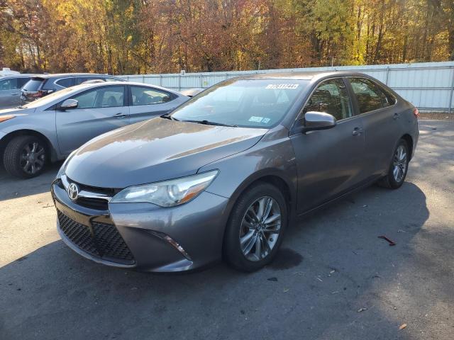 TOYOTA CAMRY HYBR 2016 with VIN 4T1BF1FKXGU136995 - Photo from auction