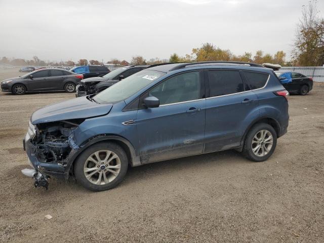 FORD ESCAPE SE 2018 with VIN 1FMCU0GD0JUC82995 - Photo from auction
