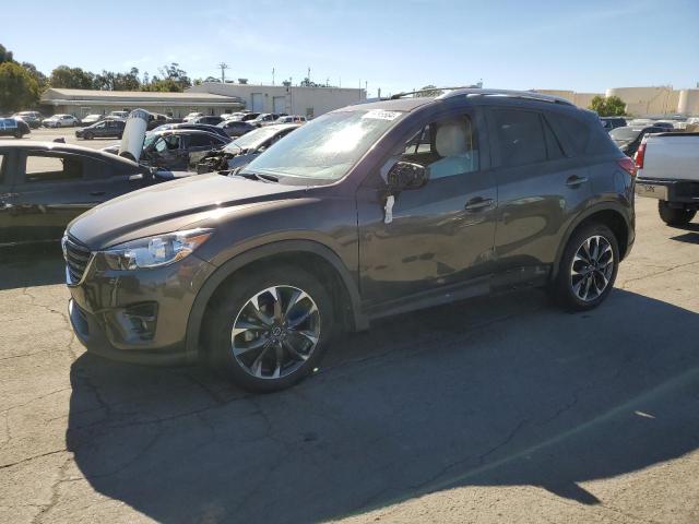 MAZDA CX-5 GT 2016 with VIN JM3KE4DY9G0895104 - Photo from auction