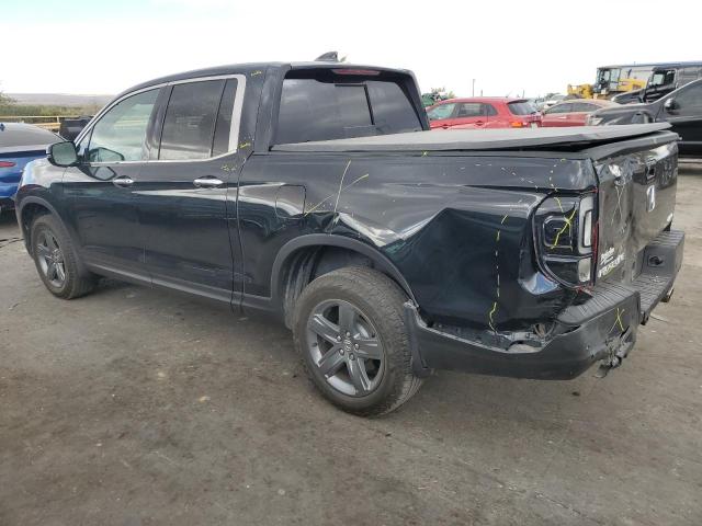 Photo 2 from auction – 2023 HONDA RIDGELINE with VIN 5FPYK3F70PB038902