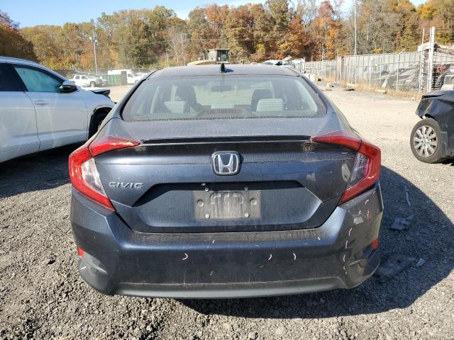Photo 6 from auction – 2018 HONDA CIVIC EX with VIN 2HGFC1F37JH643520