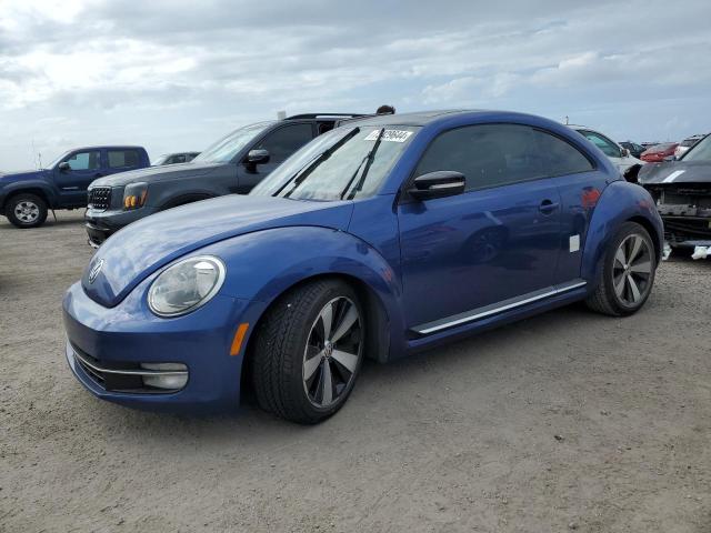 VOLKSWAGEN BEETLE TUR 2012 with VIN 3VWV67AT0CM650936 - Photo from auction