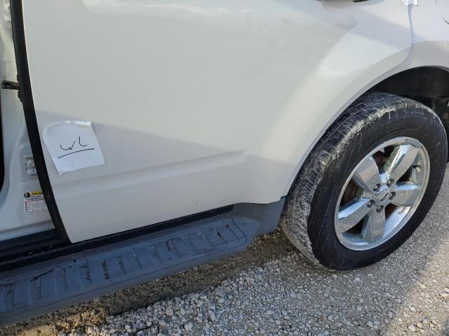 Photo 13 from auction – 2011 FORD ESCAPE LIM with VIN 1FMCU0EGXBKC60108