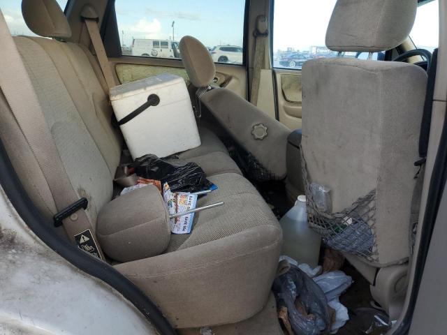 Photo 11 from auction – 2002 MAZDA TRIBUTE LX with VIN 4F2YU09182KM09244