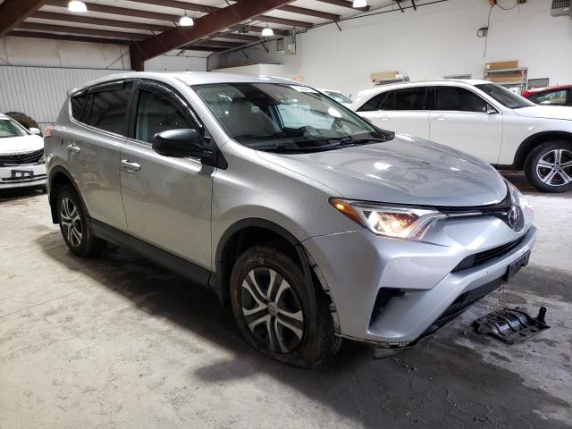 Photo 4 from auction – 2018 TOYOTA RAV4 LE with VIN 2T3BFREV8JW850178