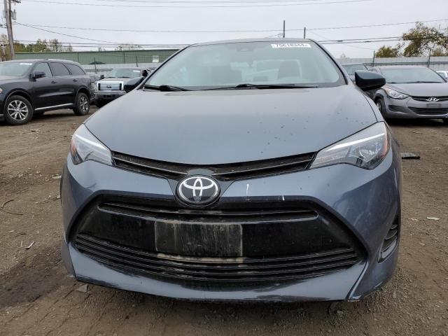 Photo 5 from auction – 2017 TOYOTA COROLLA L with VIN 2T1BURHEXHC949848