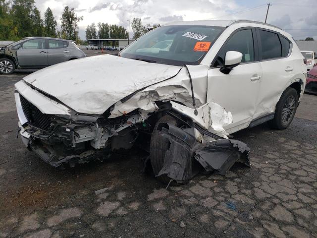 MAZDA CX-5 TOURI 2021 with VIN JM3KFACM9M1307833 - Photo from auction