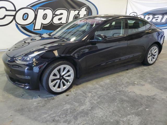 TESLA MODEL 3 2022 with VIN 5YJ3E1EAXNF371455 - Photo from auction