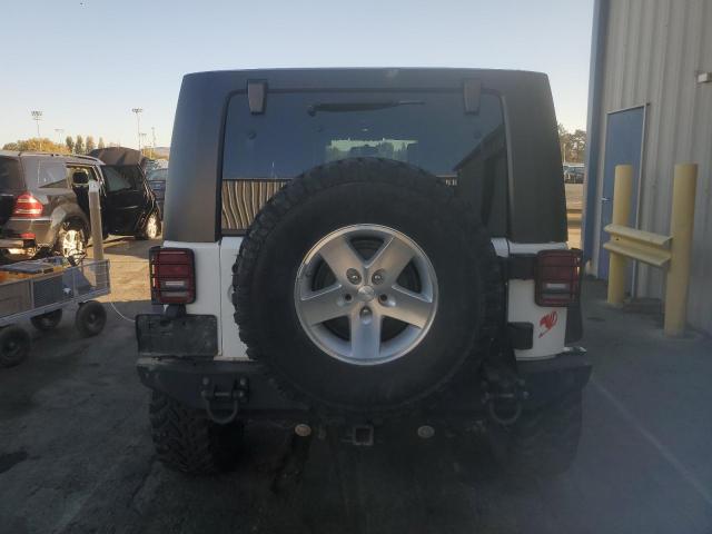 Zdjęcie 6 z aukcji – 2009 JEEP WRANGLER U z VIN 1J4GA69129L778574