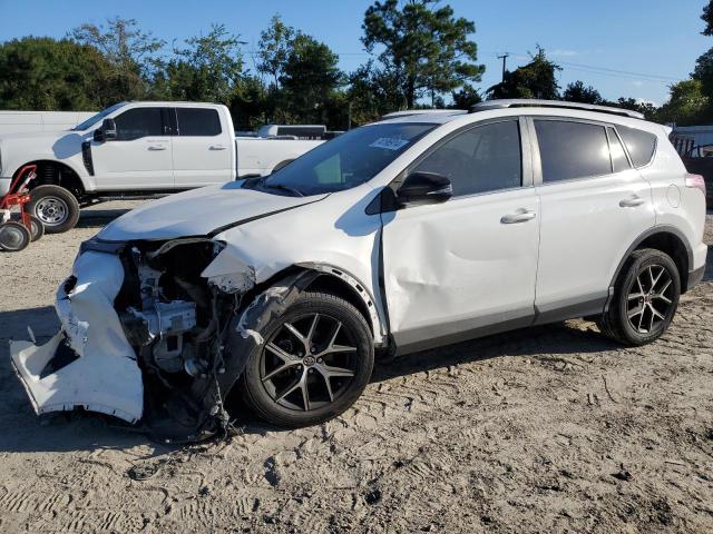 TOYOTA RAV4 SE 2017 with VIN JTMNFREV9HJ705527 - Photo from auction