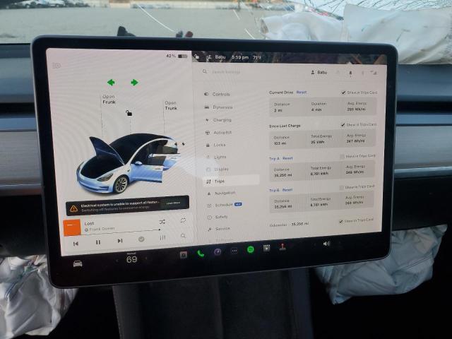Photo 9 from auction – 2021 TESLA MODEL 3 with VIN 5YJ3E1EBXMF101052