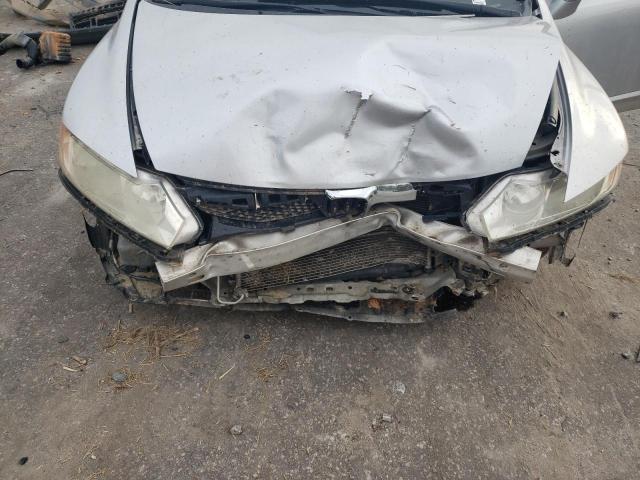 Photo 11 from auction – 2010 HONDA CIVIC LX with VIN 19XFA1F53AE083125