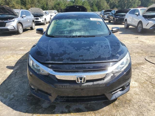 Photo 5 from auction – 2016 HONDA CIVIC EX with VIN 19XFC1F31GE011308