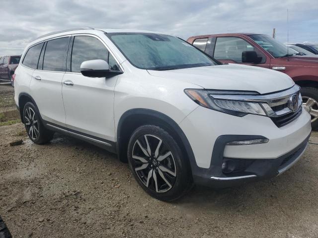 Photo 4 from auction – 2021 HONDA PILOT TOUR with VIN 5FNYF5H69MB037787