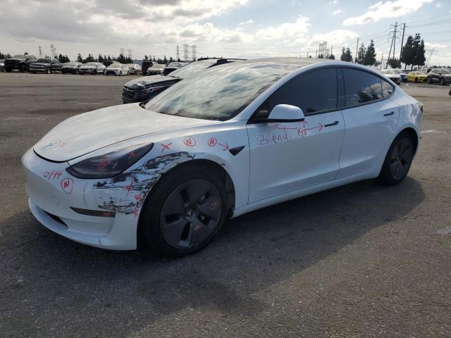 TESLA MODEL 3 2021 with VIN 5YJ3E1EBXMF879612 - Photo from auction