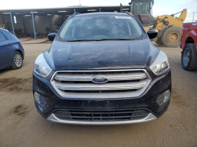 Photo 5 from auction – 2018 FORD ESCAPE SE with VIN 1FMCU9GD4JUC90196