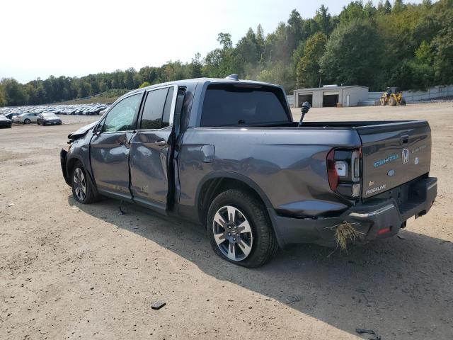 Photo 2 from auction – 2018 HONDA RIDGELINE with VIN 5FPYK2F69JB002196