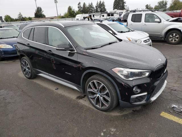 Photo 4 from auction – 2017 BMW X1 XDRIVE2 with VIN WBXHT3C30H5F75091