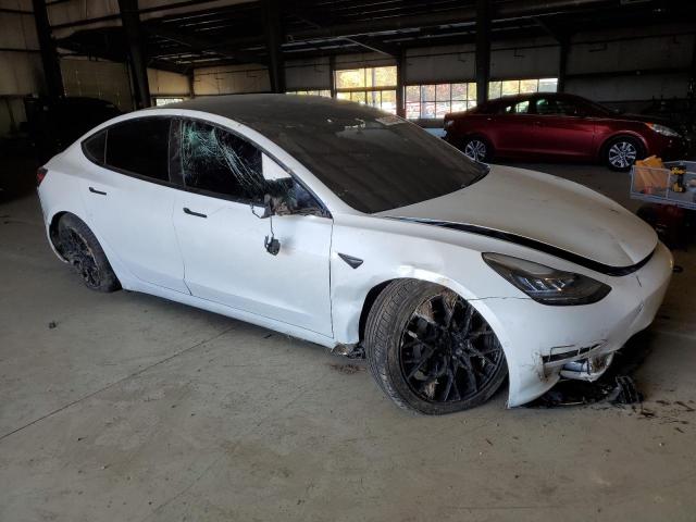 Photo 4 from auction – 2021 TESLA MODEL 3 with VIN 5YJ3E1EA2MF859703