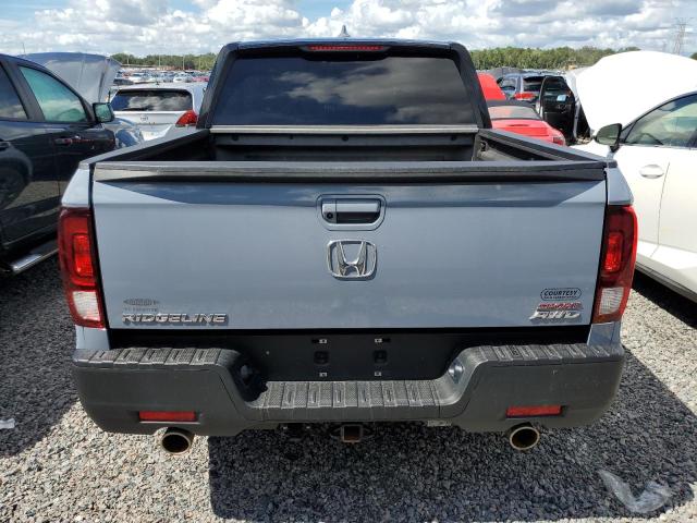 Photo 6 from auction – 2023 HONDA RIDGELINE with VIN 5FPYK3F11PB038600