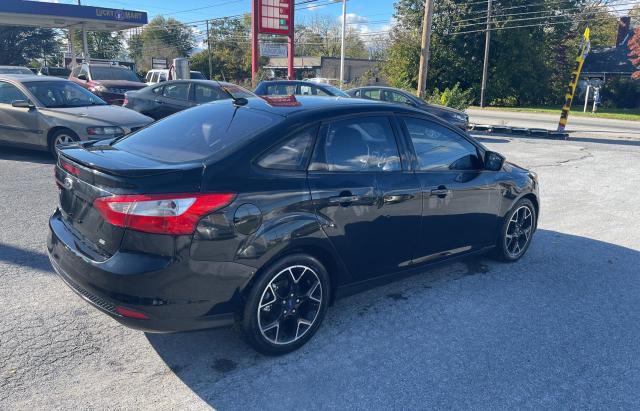 Photo 4 from auction – 2013 FORD FOCUS SE with VIN 1FADP3F23DL249619