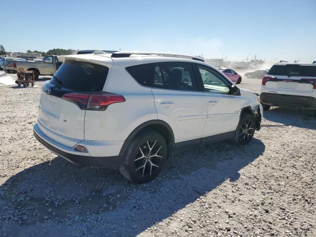 Photo 3 from auction – 2017 TOYOTA RAV4 SE with VIN JTMNFREV0HJ146482