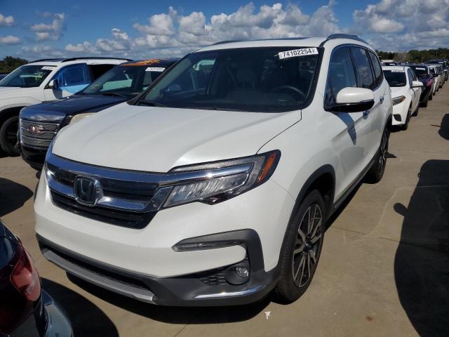 Photo 5 from auction – 2021 HONDA PILOT TOUR with VIN 5FNYF5H64MB041813