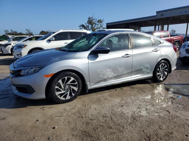 HONDA CIVIC EX 2018 with VIN 19XFC2F77JE000345 - Photo from auction