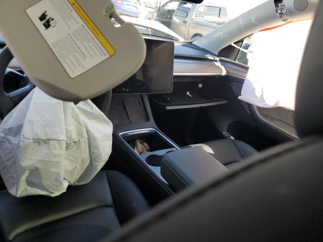 Photo 8 from auction – 2023 TESLA MODEL Y with VIN 7SAYGDEE9PF609323