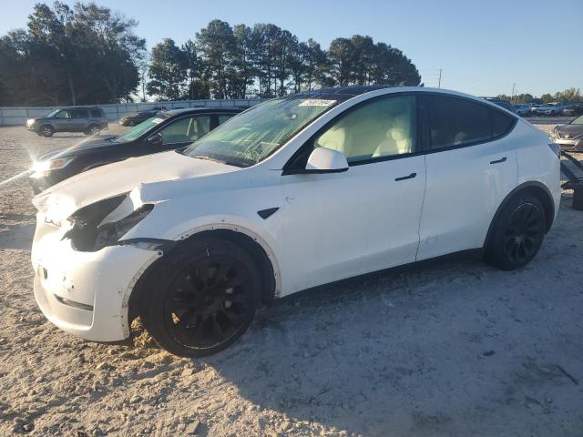 TESLA MODEL Y 2022 with VIN 7SAYGAEEXNF314033 - Photo from auction